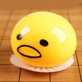 SQUISHY PUKING EGG YOLK STRESS BALL WITH YELLOW GOOP