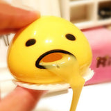 SQUISHY PUKING EGG YOLK STRESS BALL WITH YELLOW GOOP